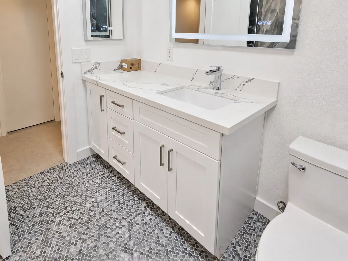 Moody bathroom with richly toned tile