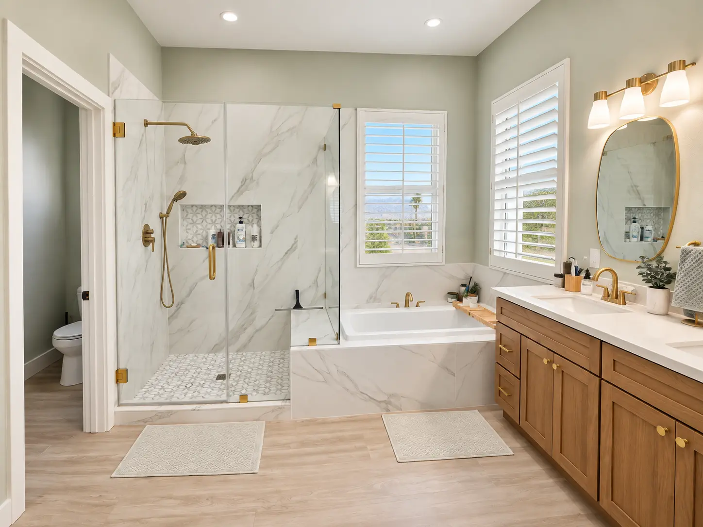 Refined primary bathroom with custom finishes